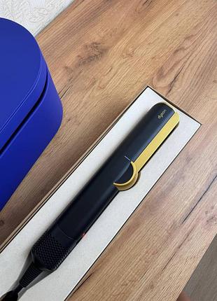 Фени та випрямлячі dyson різного типу зі складу