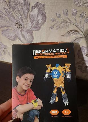 Годинник трансформер іграшка розвиваюча