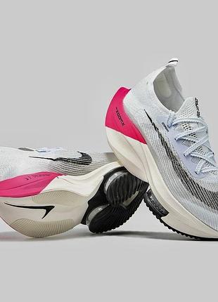 Кросівки nike білі з рожевим(стелька23,5)