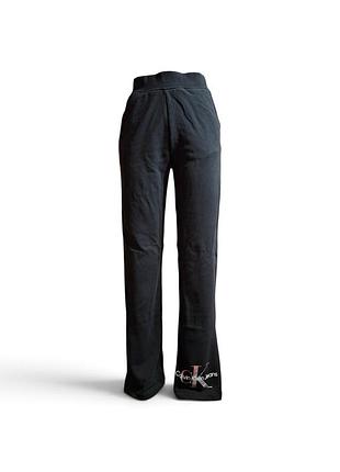 Женские спортивные штаны calvin klein jeans черного цвета, выполненные из мягкого трикотажа, размер xs.