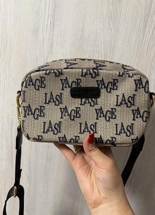 Сумка жіноча lasi yage через плече бежева з написом
