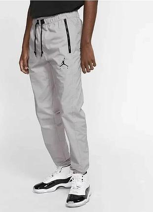 Штани спортивні чоловічі air jordan jumpman casual woven sports pants gray av1841-059