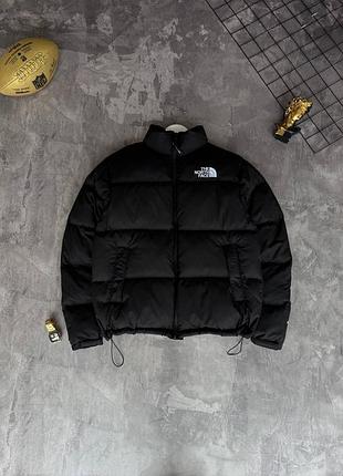 Пуховик tnf черного цвета