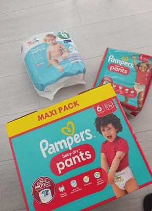 Підгузники pampers і mamia