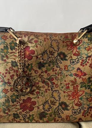 Сумка guess з квітковим принтом та золотим напиленням