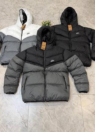 Пуховик від бренду бренду nike storm-fit