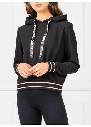 Оригінал чорне жіноче худі бренду guess (зокрема модель із колекції guess jeans із брендованими шнурками-зав'язками та смугастими манжетами й низом)