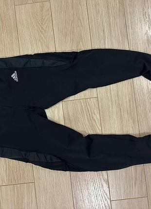 Оригинальные мужские спортивные тайтсы (леггинсы) adidas response climacool running tights в черном цвете с фирменными полосами тоном ниже.