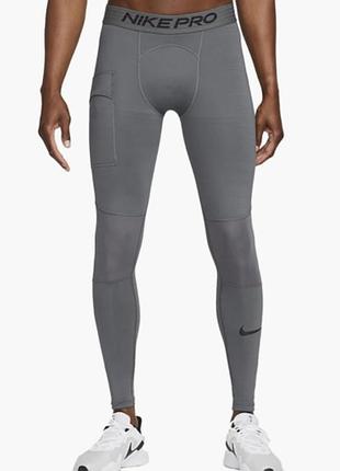 Чоловічі термоштани тайтси nike pro warm tights у сірому кольорі для зала бігу заняттям спортом м найк про