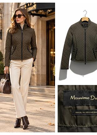 Стеганая куртка цвета хаки от бренда massimo dutti с воротником стойкой и молнией.