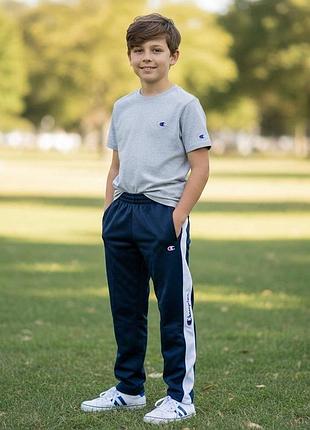 Детские спортивные штаны champion, черные с белыми лампасами на возраст 9–10 лет(138-143см)