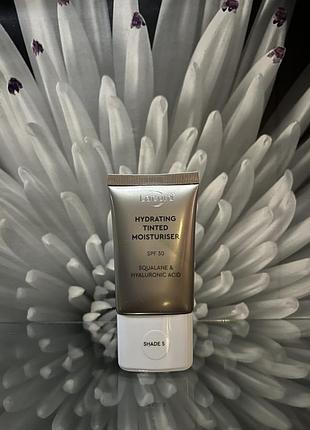 Тональний крем для обличчя lacura hydrating tinted moisturiser