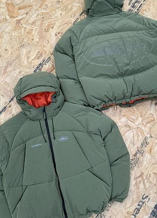 Пуховик чоловічий corteiz puffer jacket темно-зелений