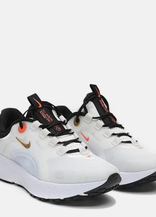 Жіночі бігові кросівки nike react escape run (модель  у білому кольорі із золотистими та чорними деталями