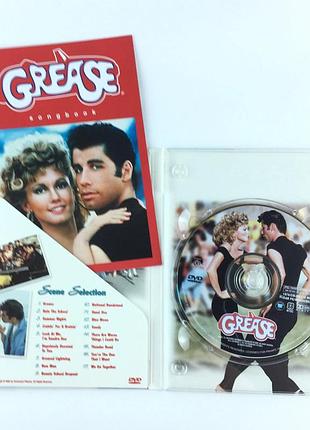 «фильм “бриолин” (grease), широкоэкранный формат, со сборкой песен. в ролях: джон траволта и Оливия24тон-джон». dvd диск