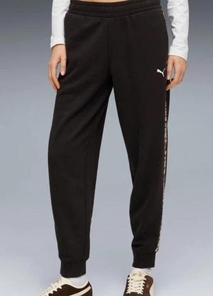Жіночі спортивні штани puma ess graphic animal high-waist sweatpants fl g — стильна та комфортна модель з високою посадкою та анімалістичним принтом.