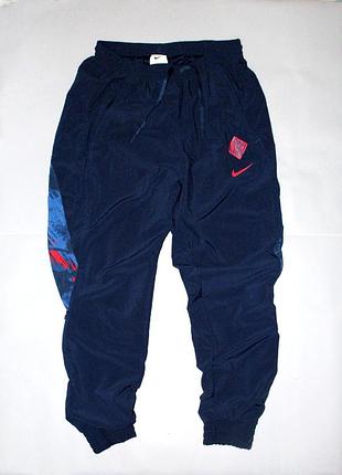 Штани nike england dri-fit woven gx track pants (blue void/challenge red)
