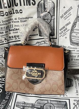 Шкіряна сумочка coach
