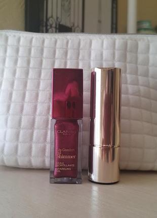 Одним лотом! помада, блеск и косметичка clarins