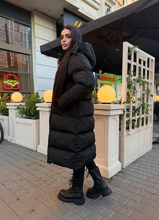 Довгий пуховик