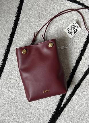 Жіноча шкіряна сумка loewe pebble pouch in smooth calfskin burgundy