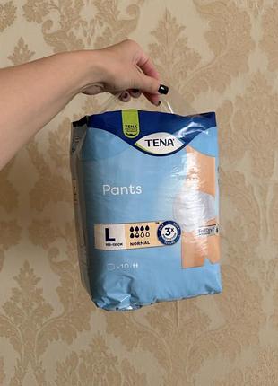 Підгузки-труси tena pants normal розміру l для обхвату талії 100-135 см.