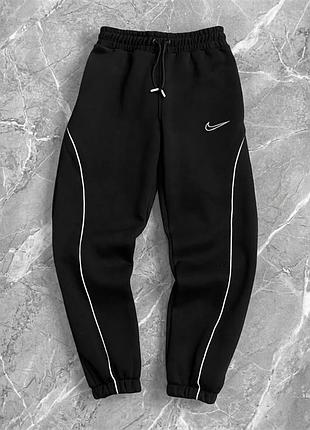 Спортивні штани nike на флісі з кантом, теплі штани найк тринитка чорні, зимові штани nike з логотипом l