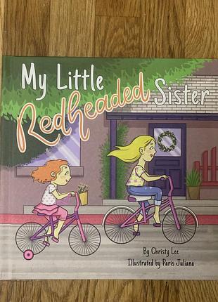 Дитяча книга "my little redheaded sister" авторів christy lee та paris juliana.