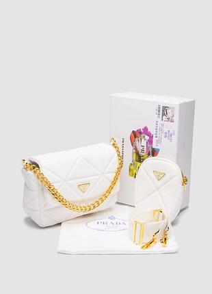 Жіноча шкіряна сумка prada padded на плече біла із золотистою фурнітурою