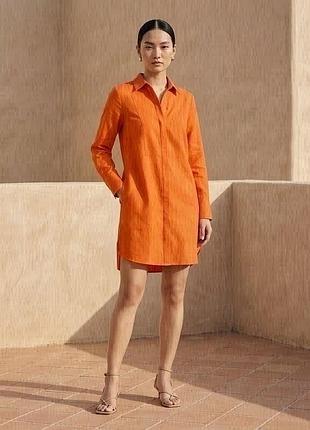 Оранжеву жіночу сукню-туніку з чистого льону від бренду marks & spencer jaeger.