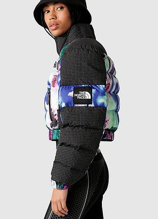 Оригінальний пуховик the north face у багатобарвному дизайні. розмір s-m стан нового  після хімчистки  купувала в італії