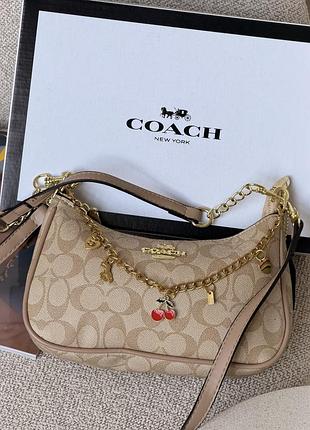 Сумка coach teri in signature canvas пісочний