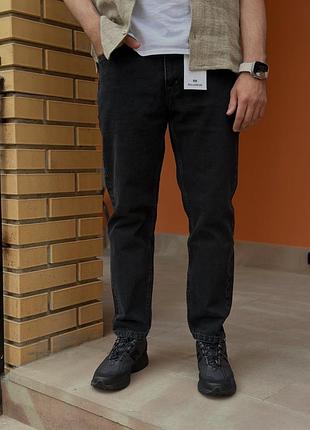Pull&bear  джинси в чорному кольорі. мають підвужену штанку. standard fit.