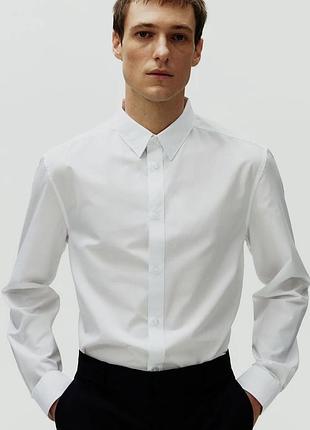 H&m  ідеально біла сорочка, на довгий рукав. тканина карго тримає форму. slim fit.