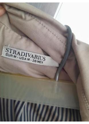 Тренч клроткий 
 stradivarius .
p.s/m 6