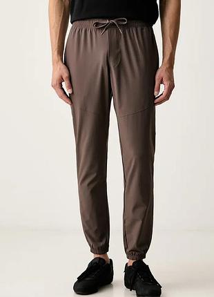 Urbanshop com ua under armourспортивные брюки мужские vibe woven коричневые high waist 1386557.200 размеры запитуйте