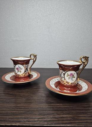 Коллекционные винтажные кофейные пары jager eisenberg (немеченица, гдр), фарфор, позолота, 2 шт.