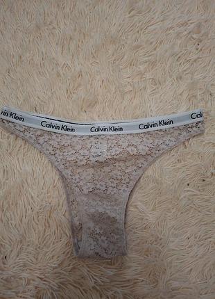 Трусики жіночі calvin klein стринги мереживні бежеві