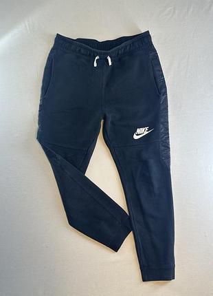 Спортивні штани чоловічі nike темно-сині eur m