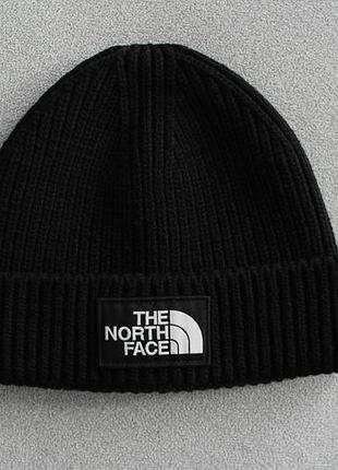 Актуальна шапка-бінні the north face чорного кольору made in italy