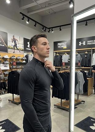 Чоловічий компресійний термолонгслів under armour coldgear armour elements compression mock long sleeve в темно сірому кольорі з полієстру і еластану