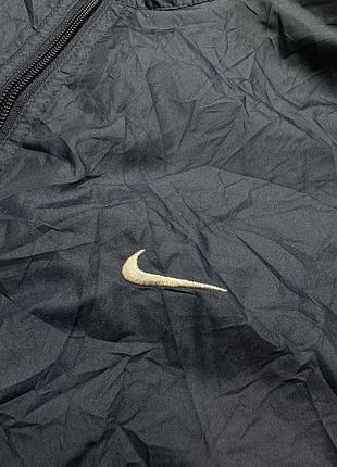 Темно-синя вінтажна вітровка nike 3