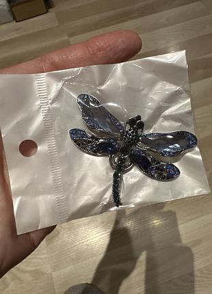 Брошка нова.