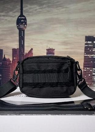 Компактна тактична сумка-підсумок бренду protector plus чорного кольору.  система molle та панель velcro