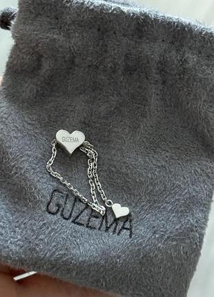 Кільце жіноче guzema з білого золота 585 проби з двома сердечками