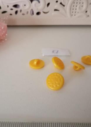 58. ґудзики жовті на ніжці