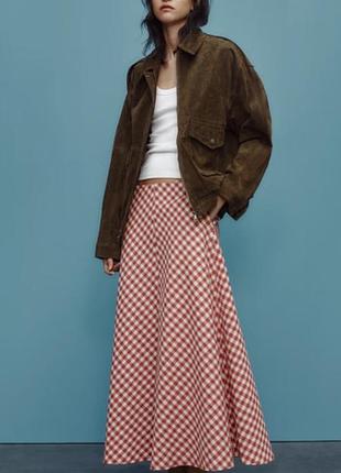 Довга розкльошена спідниця в клітинку від бренду zara