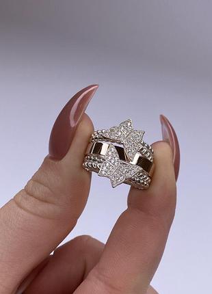 Серебряное кольцо 925 пробы с фианитами с золотой накладкой