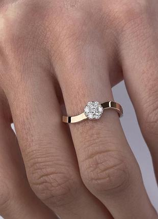 Серебряное кольцо 925 пробы с фианитами с золотой накладкой