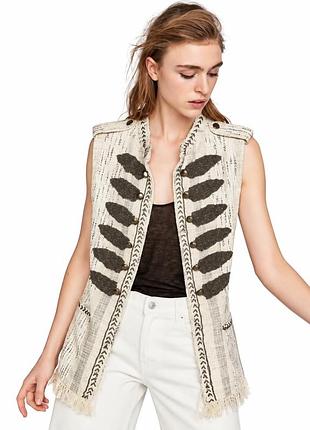 Zara — гусарський жилет у стилі бохо молочного кольору з декоративною вишивкою та бахромою